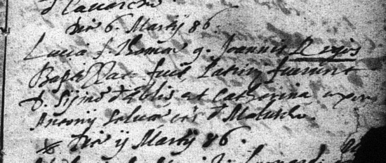 1586 baptismal record of Lucia Rigos of Malosco, Sarnonico parish register.